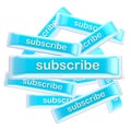 Pile of glossy bright subscribe buttons isolated