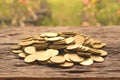 pile of gold coin on the wooden background financial and saving Royalty Free Stock Photo