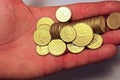 Pile of gold coins treasure held hand HD