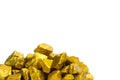 A pile of gold nuggets or gold ore on white background, precious stone or lump of golden stone, financial and business concept Royalty Free Stock Photo