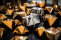 a pile of gold and silver gift boxes on a table Royalty Free Stock Photo