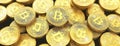 Pile of golden bitcoin currency coins represents digital finance future Royalty Free Stock Photo