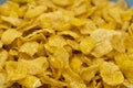 Pile of Golden cornflakes in the blue bowl ready for adding fresh milk for breakfast Royalty Free Stock Photo