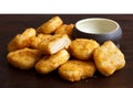 Pile of golden deep-fried battered chicken nuggets. Royalty Free Stock Photo