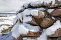 Pile of granite cobblestones covered in snow. Traveling in Kyrgyzstan