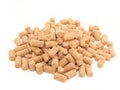 Pile of granules Wheat Bran background. Food for horses and far