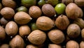A pile of green and brown nuts