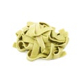 Pile of green fettucce pasta isolated Royalty Free Stock Photo