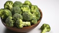 Pile of green raw uncooked broccoli on bowl. Vegan diet concept. top view. Generative AI