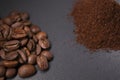 Pile of ground or instant coffee and roasted coffee beans seeds. background Royalty Free Stock Photo