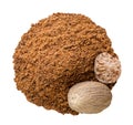 Pile of ground nutmeg and nutmeg on a white background. Top view Royalty Free Stock Photo