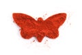 Pile of ground paprika isolated in butterfly shape Royalty Free Stock Photo