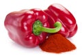 Pile of ground paprika with pepper on white background Royalty Free Stock Photo