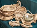 Pile of handcrafted sweet grass baskets for sale Royalty Free Stock Photo