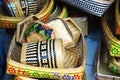 Pile of handwoven baskets with colorful patterns in Bali Indonesia