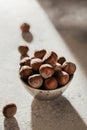 Pile of hazelnuts filbert in a bowl on a white background Royalty Free Stock Photo