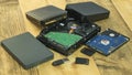 Pile of hdd memory storage devices over dark surface,tech components,usb,memory