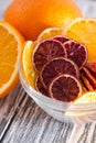 A pile of healthy colorful fruit chips on a white background in a transparent plate. Close-up Royalty Free Stock Photo