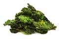 Pile of healthy kale chips isolated on white Royalty Free Stock Photo