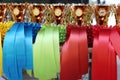 Pile of horse riding ribbons and trophy awards. Group of beautiful colorful trophies Royalty Free Stock Photo