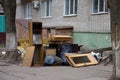 A pile of household furnishings, damaged by Hurricane