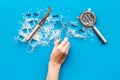 Pile of ice cubes and bar equipment on blue bar table top view Royalty Free Stock Photo