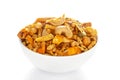 Pile of Indian spicy snacks Namkeen - `All in one` in a white bowl, made with fried peanut, corn flakes, sweet pea, pulses, cash Royalty Free Stock Photo
