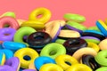 Pile of inflatable ring for swimming pool isolated on pink background