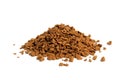 a pile of instant coffee granules lies on a white background