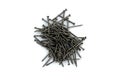 A pile of iron nails lie on a white background Royalty Free Stock Photo