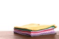 Pile of ironed clothes on table Royalty Free Stock Photo