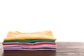 Pile of ironed clothes on table. Space for text Royalty Free Stock Photo