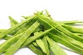 Pile of italian flat green beans on a white background Royalty Free Stock Photo