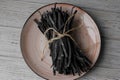 Pile of Italian home made raw pasta on a plate. Royalty Free Stock Photo