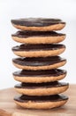 Pile of jaffa chocolate cakes on the wooden board Royalty Free Stock Photo