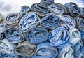 pile of jeans, concept of pollution of the planet, IA enerated