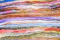 Pile of knitted colorful shawls for background Royalty Free Stock Photo