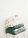 Pile of warm winter sweaters and blankets Royalty Free Stock Photo