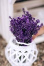 Pile of lavender flower bouquets on a wooden old bench in a summer garden. bouquet of lavender Royalty Free Stock Photo