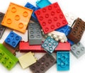 Pile of Lego constructor blocks on white