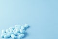 Pile of little oval blue pills Royalty Free Stock Photo