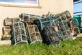 A pile of lobster pots stacked near the coast of Dannet beach, Caithness, Scotland Royalty Free Stock Photo