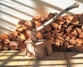 A Pile of Logs and an Axe Royalty Free Stock Photo