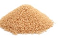 Pile of long grain brown rice isolated on white background Royalty Free Stock Photo