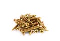 A pile of long wood screws on a white background Royalty Free Stock Photo