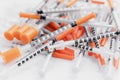 Pile of medical syringes for insulin for diabetes