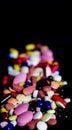 Pile of medicine pills tablets capsules in black background Royalty Free Stock Photo