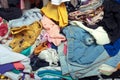 Pile of messy clothes in closet. Untidy cluttered woman Royalty Free Stock Photo
