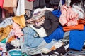 Pile of messy clothes in closet. Untidy cluttered woman Royalty Free Stock Photo