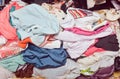 Pile of messy clothes in closet. Untidy cluttered woman. Royalty Free Stock Photo